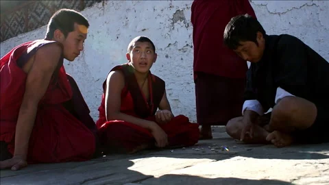 Buddhist Monks Playing Board Game In Punakha-Dzong, Bhutan Stock Footage 156738896