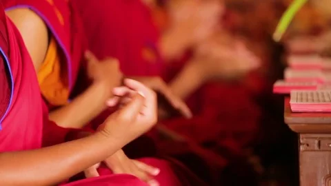 Buddhist monks praying at the temple with gestures Stock Footage 77443588