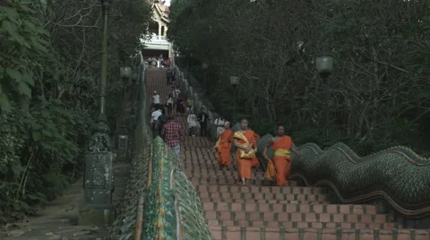 Buddhist monks on steps of Wat Phra That Doi Suthep, Chiang Mai, Thailand Stock Footage 48205656
