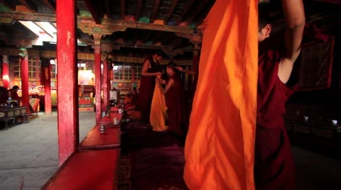 Buddhist monks walking out of monastery at temple, Mustang, Nepal Stock Footage 62923779