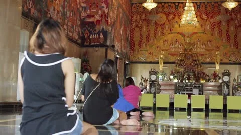 Buddhist people pray in temple Stock Footage 10592874