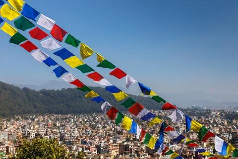 Buddhist prayer flags against the backdrop of the Kathmandu valley Stock Photos