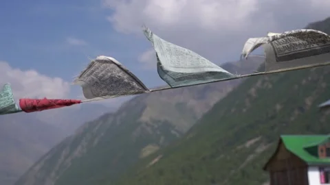 Buddhist prayer flags (lungta) in Spiti Valley and Ladakh. Flying prayer flag Video stock 201514935