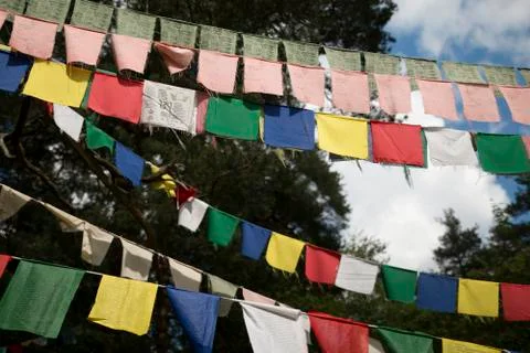 Buddhist prayer flags with mantra. Five color flags Stock Photos