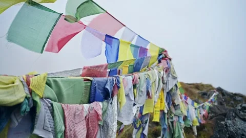 Buddhist Prayer Flags in Mountain Mist in Nepal, Colourful Tibetan Prayer Flags Stock Footage 343856966