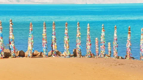 Buddhist prayer flags waving on Qinghai Lake shore Stock Footage 337024521