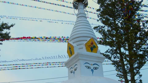 Buddhist Prayer Flags in the Wind and White Temple Stupa In Kathmandu Nepal Asia Stock Footage 168599010