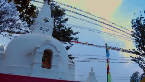 Buddhist Prayer Flags in the Wind and White Temple Stupa In Kathmandu Nepal Asia Stock Footage 168599671
