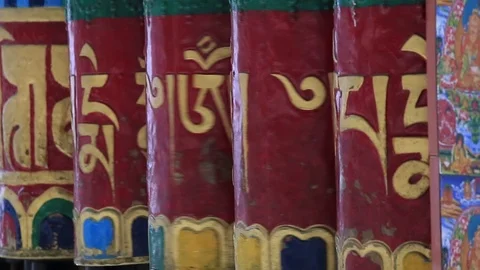 Buddhist prayer wheels in monastery with written mantra. India, Himalaya, Ladakh Stock Footage 70955065
