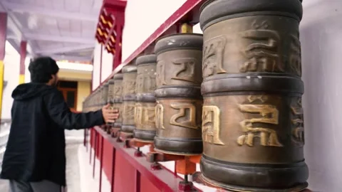 Buddhist Puja Ceremony with Prayer Wheels and Offerings Stock Footage 316892131