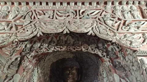 Buddhist Relief Sculptures and Painted Carvings at Yungang Grottoes, China Stock Footage 340673968