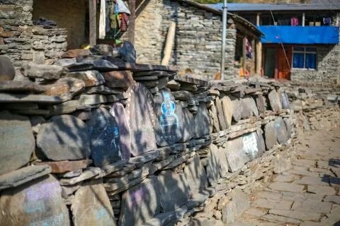 Buddhist scripts written on the stones Stock Photos