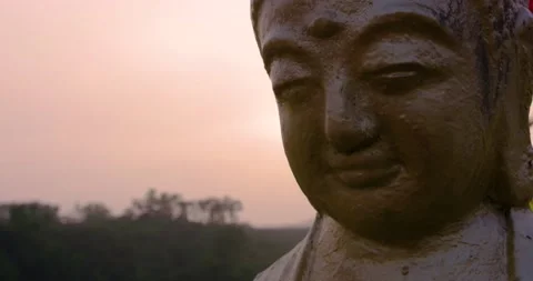 A buddhist statue during the sunset at Fo Guang Shan Memorial in Taiwan. Stock Footage 140253483