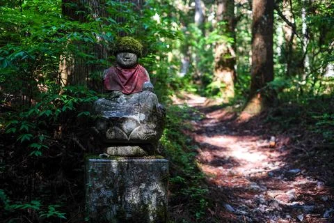 Buddhist statue in a forest Stock Photos