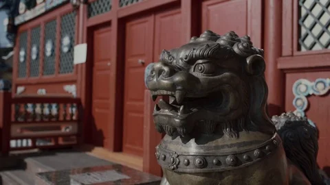 Buddhist statue near a temple Stock Footage 122274857