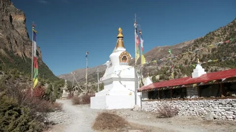 Buddhist Stupa on the background of snow peaks in Nepal, Himalayan mountains. Video stock 144862815