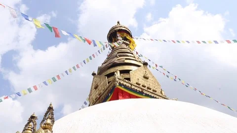 Buddhist Stupa with flying Buddhist Prayer Flag in Nepal Видео 127646816