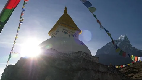 Buddhist stupa on mountain trekking path in Himalayas, Nepal. Crane shot Stock Footage 82895554
