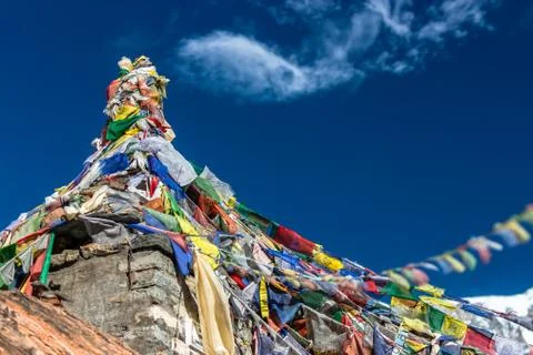Buddhist stupa with pray flags Stock Photos