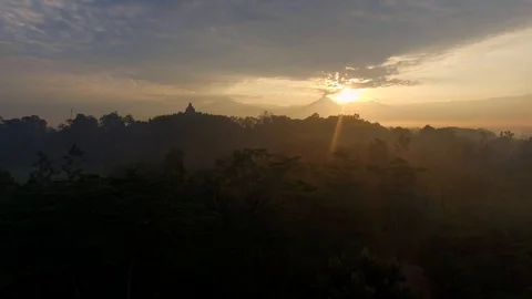 Buddhist temple and forest at sunset Stock Footage 95698017