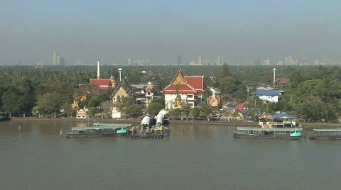 Buddhist temple on the  Chao Phraya Stock Footage 692910