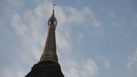 Buddhist temple spire, clouds, Burma Stock Footage 102634294