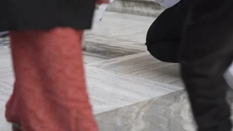 Buddhist walking barefoot and circumambulate the Mahabodhi temple Stock Footage 229848751