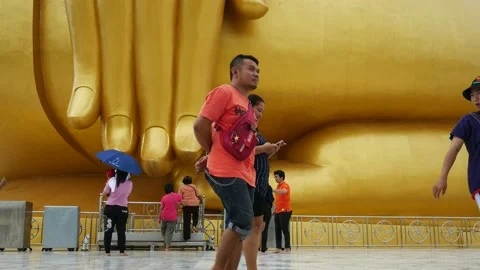 Buddhists and Big Buddha Stock Footage 130862755