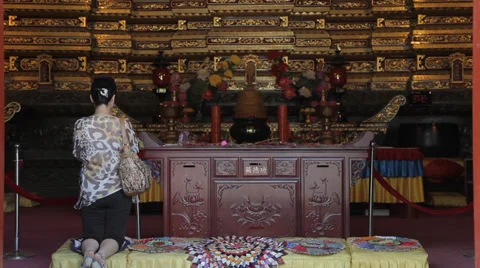 Buddhists pray inside the Temple Stock Footage 35757517
