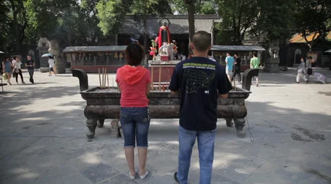 Buddhists pray inside the Temple ,Xi'an city, Shaanxi province, china. Stock Footage 35803608