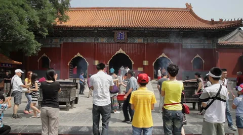 Buddhists pray inside the Yonghe Temple Temple, Beijing, china. Stock Footage 36484485
