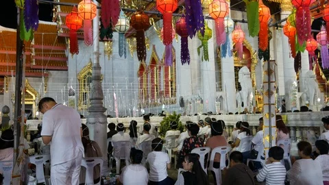 Buddhists praying in temple during New Year Eve 動画素材 107918847