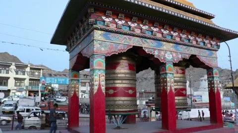 Buddhists spin prayer wheel Stock-Footage 64643034