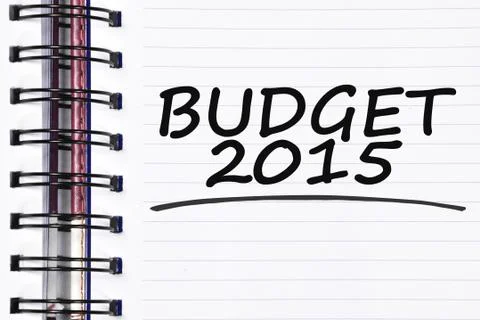 Budget 2015 words on spring note book Stock Photos
