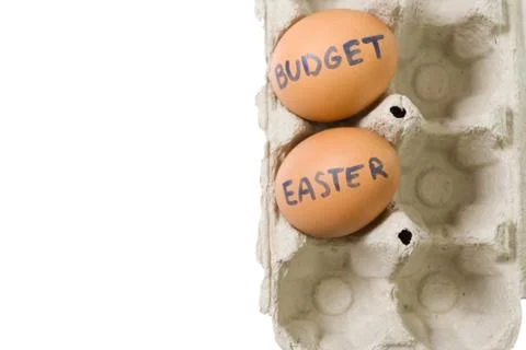 Budget Easter eggs in paper tray isolated Stock Photos