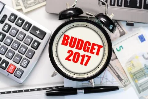 Budget exercise or forecast with old clock concept Stock Photos