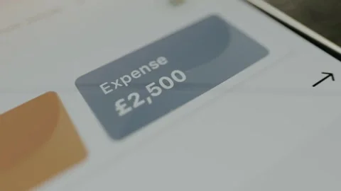 Budget tracking app displays the Expense category with the amount of 2500 pound Stock Footage 330671168
