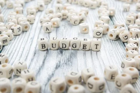 Budget word written on wood block. wooden ABC Stock Photos