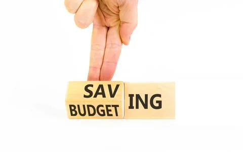 Budgeting and saving symbol. Concept words Saving to Budgeting on beautiful.. Stock Photos