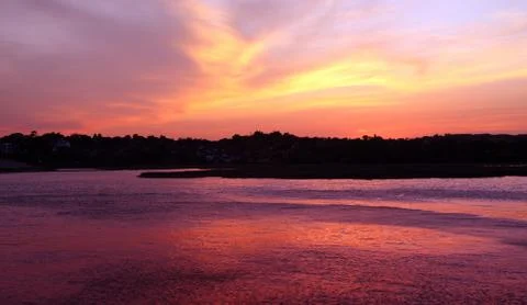 Budliegh beach at sunset Stock Photos