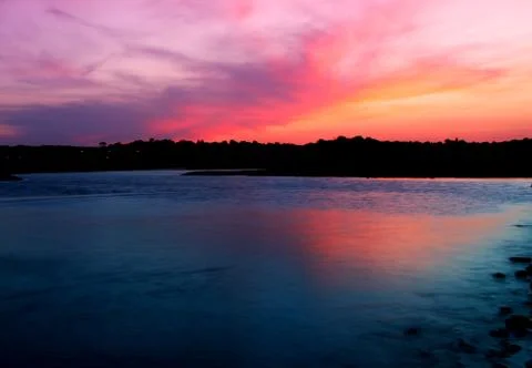 Budliegh beach at sunset Stock Photos