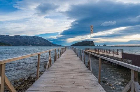 Budva Bay Pier Under A Dramatic Stormy Sky Stock Photos