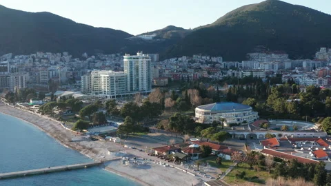 Budva Montenegro: empty sand beach in winter season. European town on the coast Stock Footage 233093175