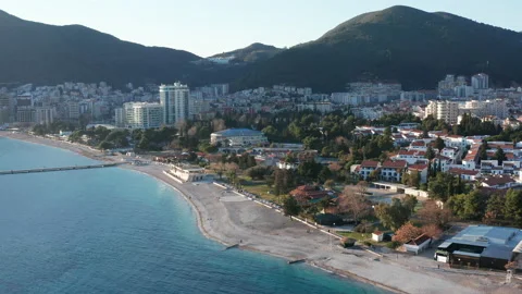 Budva Montenegro: empty sand beach in winter season. European town on the coast Stock Footage 233097065