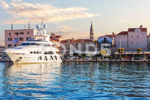 Budva scenery and the beautiful yacht of the Adriatic coast, Montenegro Stock Photos