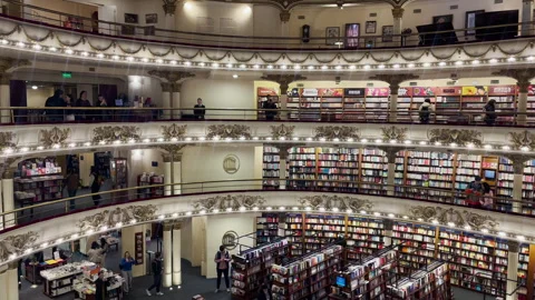Buenos Aires, Argentina – 2026, Jun 15: Visitors exploring El Ateneo Stock Footage 339300652