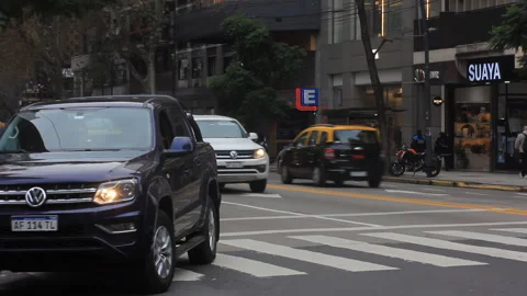 Buenos Aires, Argentina – 2026, Jun 20: Vehicles passing through city streets Stock Footage 339925380