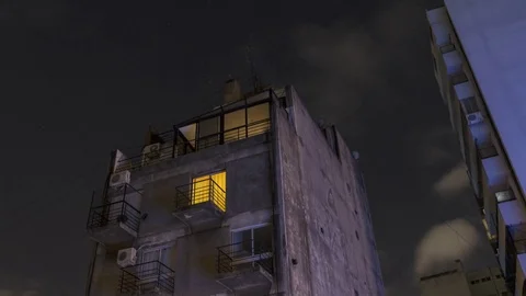 Buenos Aires Night Sky Time Lapse - Clouds, Stars, Apartment Building 4K Video stock 70795932