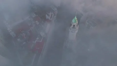 Buenos Aires Skyline and Clock Tower Above Dense Fog Drone View Stock Footage 334772775