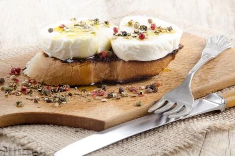 Buffalo mozzarella on oven toasted bread Stock Photos